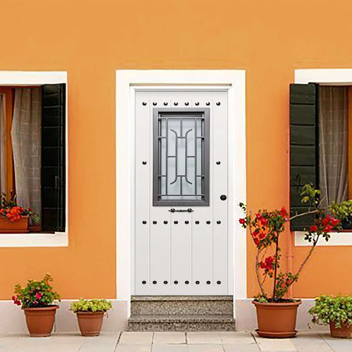 puerta-entrada-metalica-clavos-cristal-reja-lacada-blanca - Puertas Calvente